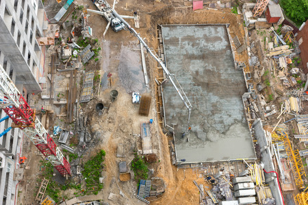 Top view of construction site with cranes in business industrial conceptの写真素材