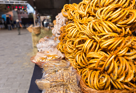 Bagels and other bread products outdoor on food festival. Food and beverages concept