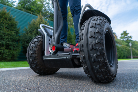 Low angle view of person using electric self-balancing personal transporterの写真素材