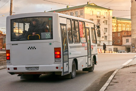 Rostov-on-Don / Russia - January 2018: The shuttle bus is moving along Route 55 along the streets of Rostov-on-Donのeditorial素材