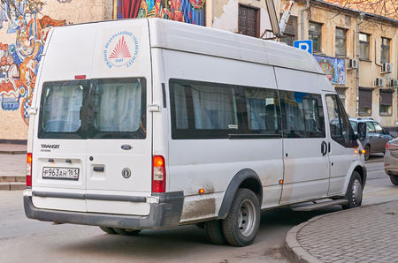 Rostov-on-Don / Russia - January 2018: The ford transit public bus carries people on the streets of a big cityのeditorial素材