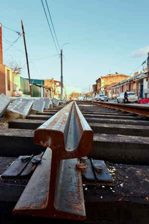 New rails and wooden sleepers are prepared for laying on gravelの写真素材