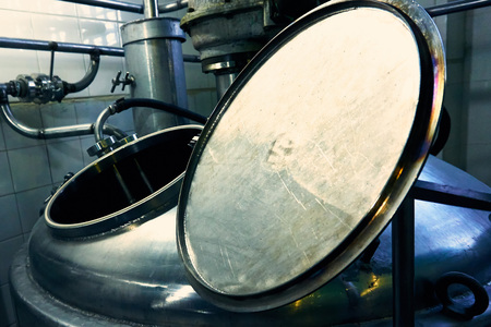 Private small brewery metal tanks and pipesの写真素材
