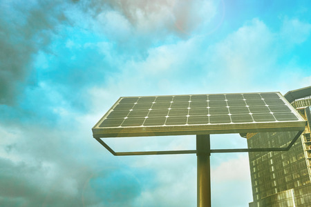 A small solar panel on the street is not the background of a new buildingの写真素材