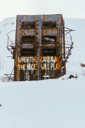 Abandoned building inscription in English in the north under the snowの写真素材