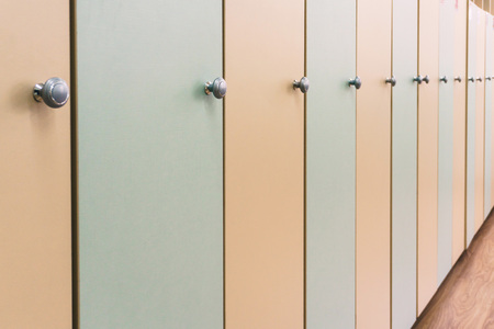 Wooden multi-colored lockers with handles in the school for young childrenの写真素材