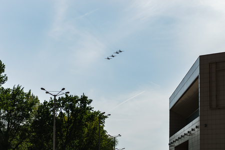 Rostov-on-Don / Russia: In the blue sky Russian combat aircraft: cargo planes, helicopters, fighters, bombers flew in the city in honor of the victory paradeの写真素材