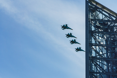 Rostov-on-Don / Russia: In the blue sky Russian combat aircraft: cargo planes, helicopters, fighters, bombers flew in the city in honor of the victory paradeの写真素材