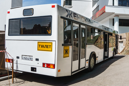 Rostov-on-Don / Russia - May 2018: A large bus with a bio-toilet placed inside the booths serves a large number of people during the holidayのeditorial素材