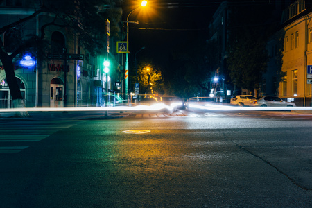 Rostov-on-Don / Russia - May 2018:  The streets of Rostov-on-Don at night in the light of headlights of cars, high lanterns and advertising stores in anticipation of the 2018 FIFA World Cupのeditorial素材