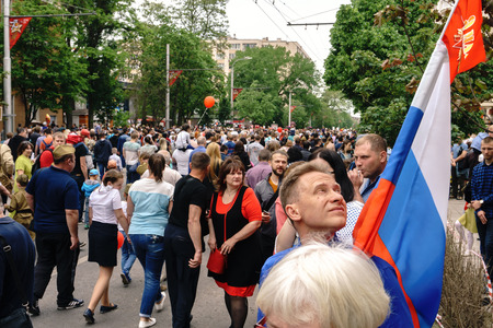 Rostov-on-Don / Russia - 9 May 2018: Thousands of people are walking along the central streets, carrying flags of Russia and the USSR and celebrating the Great Victory Day 1945のeditorial素材