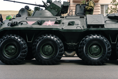 Rostov-on-Don / Russia - 9 May 2018: The military armored personnel carrier BTR 80 drove through the...