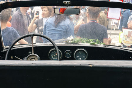 Rostov-on-Don / Russia - 9 May 2018: People in the old military uniform of 1945 on cars from the...
