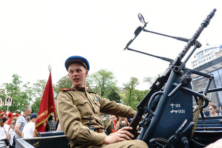 Rostov-on-Don / Russia - 9 May 2018: People in the old military uniform of 1945 on cars from the...