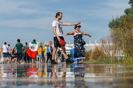 Rostov-on-Don / Russia - 23 June 2018: A lot of fans and volunteers are walking along the streets of Rostov-on-Don before the match Republic of Korea-Mexico World Cup 2018のeditorial素材