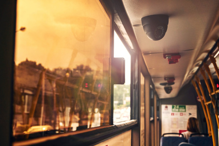 passengers in the bus opened a tinted window in the cabin of the bus that would cool the outside air insideの写真素材