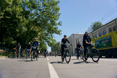 Rostov-on-Don / Russia - may 2018: a lot of people with children riding their bicycles through the...