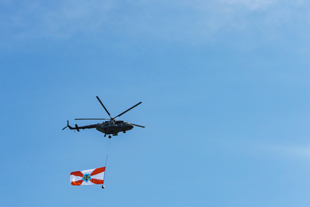 Rostov-on-Don / Russia - May 2018: military helicopters fly in the sky at low altitude during an aviation parade in honor of the holiday on the city embankment on a sunny dayのeditorial素材