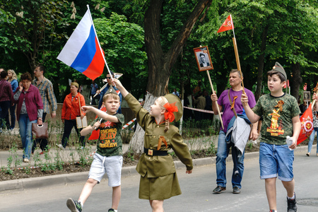 Rostov-on-Don / Russia - 9 May 2018: People in the procession of the Immortal Regiment carry portraits of the participants of World War II who are no longer alive as a sign of memory and sorrowのeditorial素材