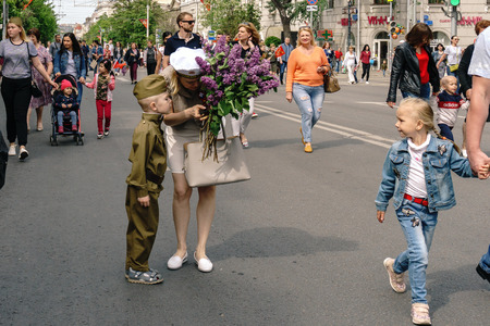 Rostov-on-Don / Russia - 9 May 2018: People with flags and in military uniform celebrate the great holiday May 9 Victory Day along the central streets of the city walking along the closed roadsのeditorial素材