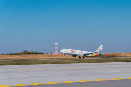 Rostov-on-Don, Platov Airport / Russia - 04 October 2019: a Boeing 737 Azur air plane in bright livery takes off from the runway at the airportのeditorial素材