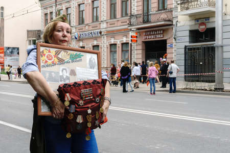 Rostov-on-Don / Russia - 9 May 2018: People in the procession of the Immortal Regiment carry portraits of the participants of World War II who are no longer alive as a sign of memory and sorrowのeditorial素材
