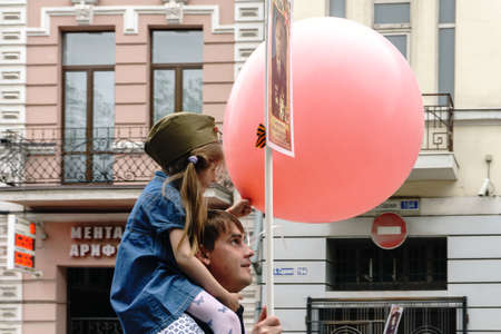 Rostov-on-Don / Russia - 9 May 2018: People in the procession of the Immortal Regiment carry portraits of the participants of World War II who are no longer alive as a sign of memory and sorrowのeditorial素材