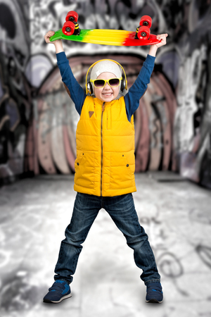 Boy skateboarder.Extreme sports, fashion children.の写真素材