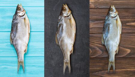 Dried ram fish on a wooden background.
