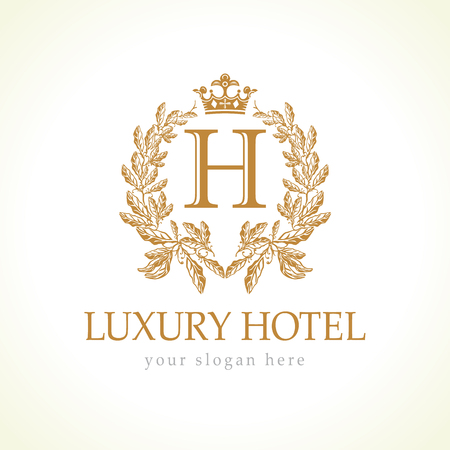 Luxurious hotel Coat of arms in gold colored royalty symbol.のイラスト素材