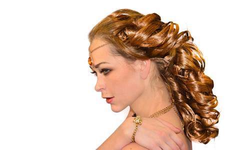 beautiful model with gold earringsの写真素材
