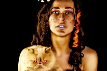 beautiful model with a catの写真素材