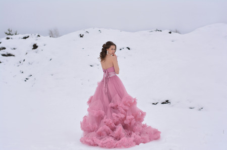 beautiful model in a dress cloudの写真素材