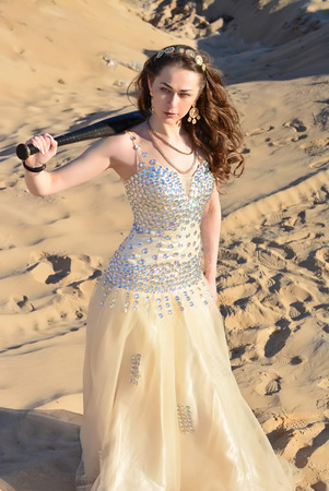 Gold Fashion Model dresses, woman in golden silk cloth beautiful girl looking at the sky the starsの写真素材