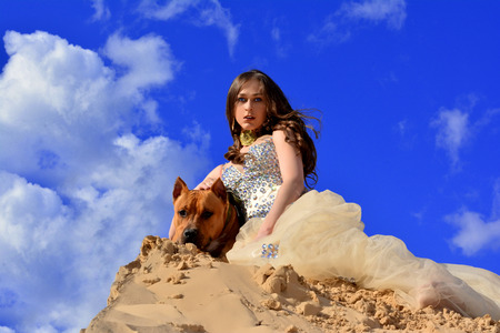Gold Fashion Model dresses, woman in golden silk cloth beautiful girl looking at the sky the starsの写真素材