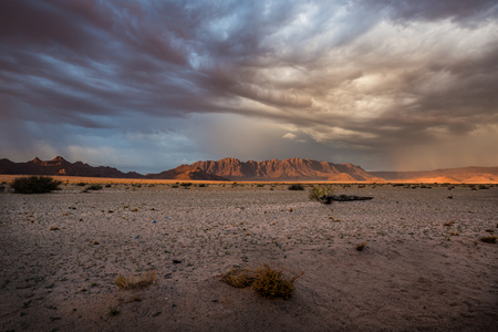 Mountains at sunset in the desert in Namibiaの写真素材