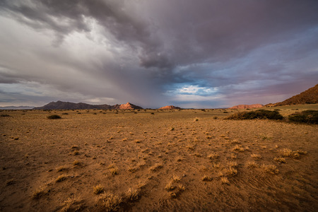 Mountains at sunset in the desert in Namibiaの写真素材