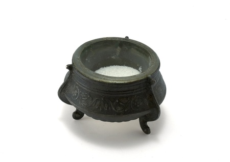 Antique bronze saltcellar on the legs and saltの写真素材