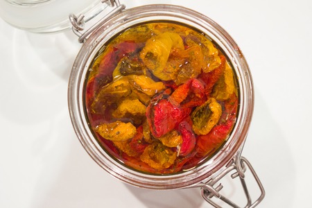homemade dried tomatoes in glass jar