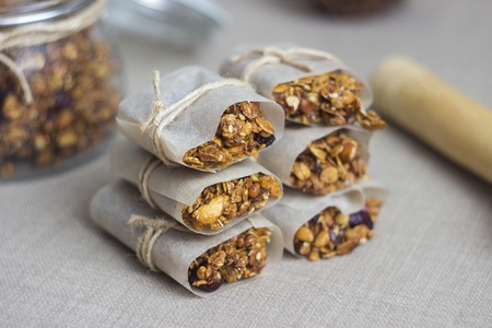 homemade rustic granola bars with dried fruits and handmade packaged