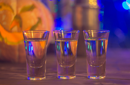 cocktail for halloween party on the scary pumpkin backstage, selective focus.の写真素材