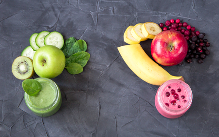 fresh smoothie variations in jars with ingredients. health food concept. top viewの写真素材