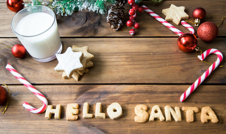 Cookies and Milk. Top View of Cookies and Milk for Santa. creative concept. space for textの写真素材
