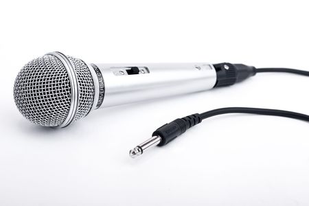 Microphone with wire, soft focus isolated on a white backgroundの写真素材