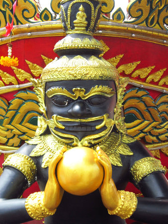 Older titan eating a moon                                の写真素材