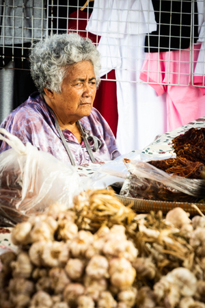 Bangkok, Thailand - June 17, 2018 : Auntie food store owner is waiting for customers.のeditorial素材