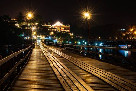 Landscape in the nights of Sangkhlaburi and the longest wooden bridge of Thailand.の写真素材