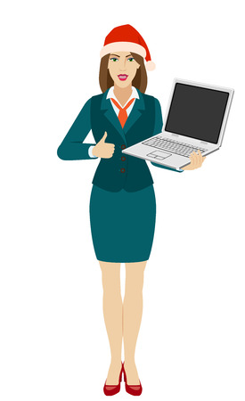 Businesswoman in Santa hat holding a laptop notebook and shows thumb up. Full length portrait of businesswoman in a flat style. Vector illustration.のイラスト素材
