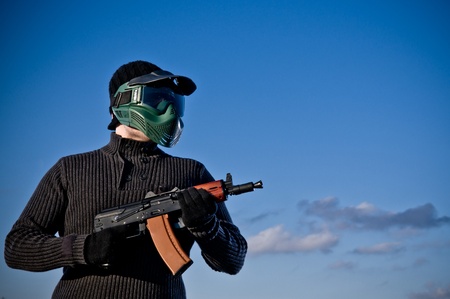 Aisoft player holding a rifle