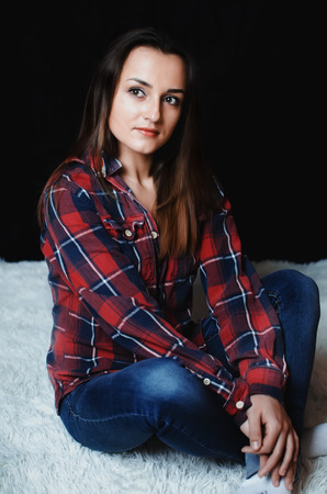 Girl in plaid shirtの写真素材